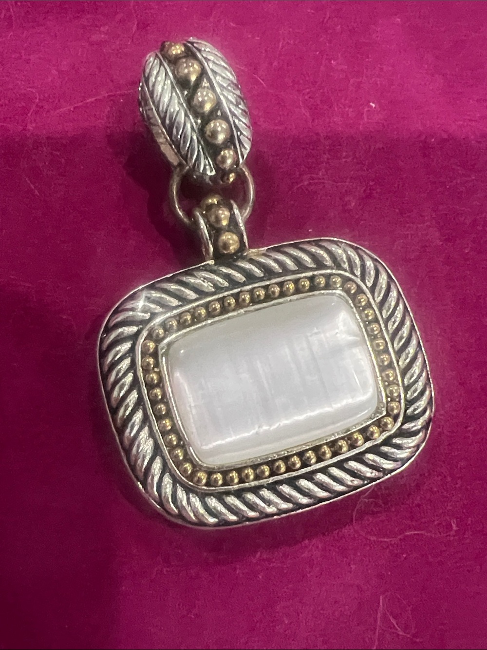 Avon vintage Silver tone and Mother of Pearl Pendant.